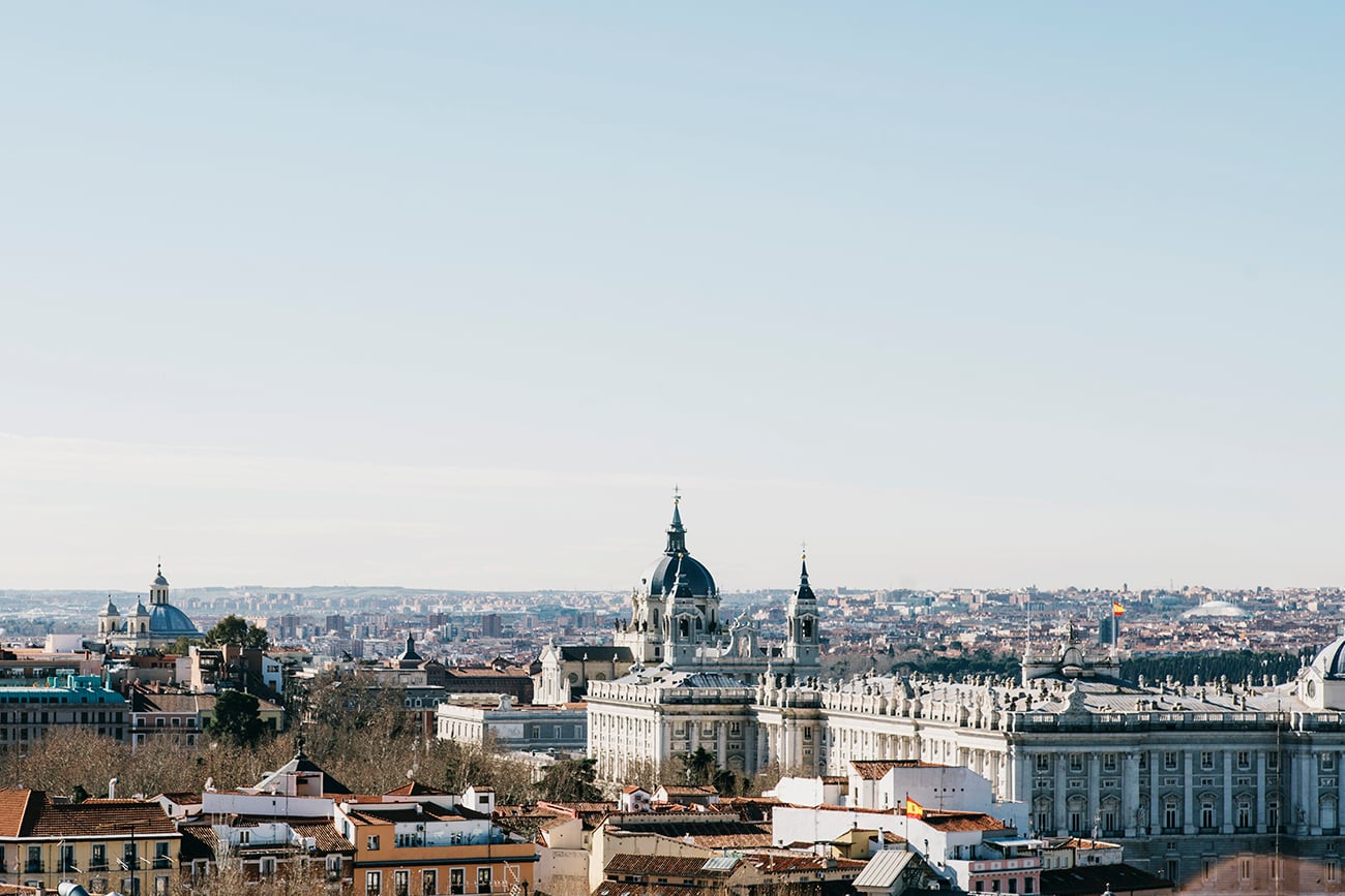 Dear Hotel, Budapest, Hungary — Neoclassical architecture and baroque spires overlooking sprawling cityscape under clear sky, elegant European urban landscape.