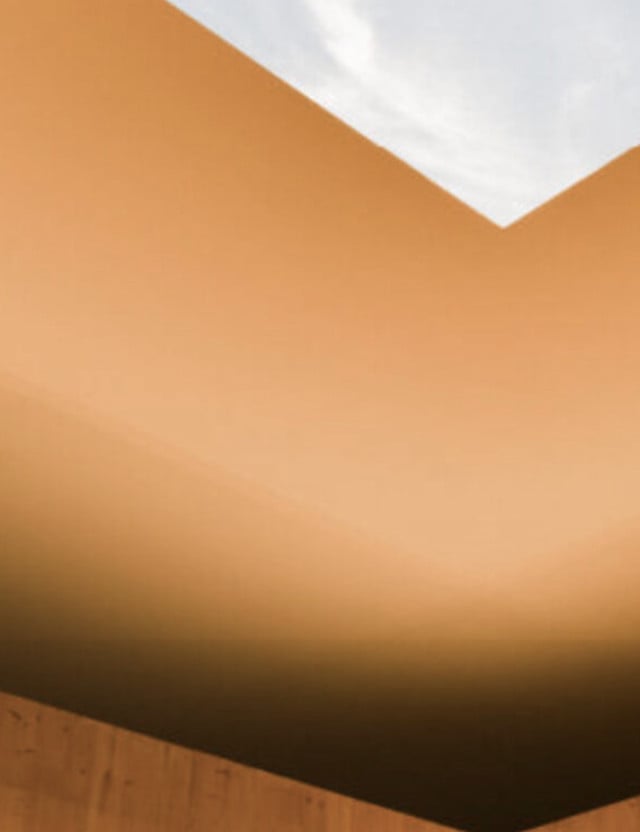 Perpetuals, Asia — Warm terracotta walls and white ceiling detail creating minimalist luxury interior with soft natural light and geometric architectural forms.