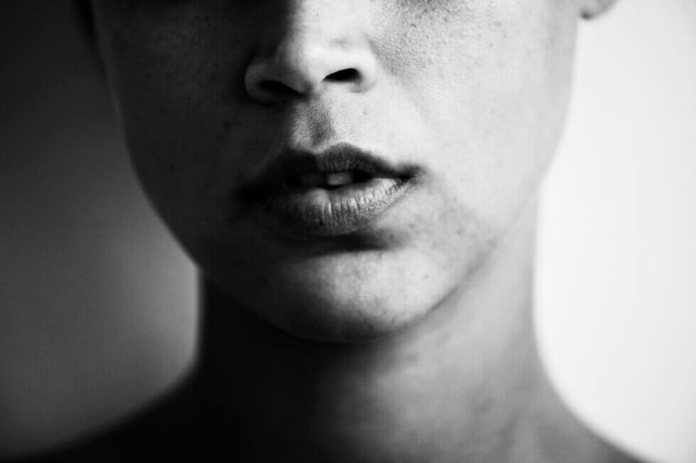 Further Hotel, Asia — Close-up black and white portrait with dramatic side lighting, minimalist aesthetic, luxury hospitality branding imagery