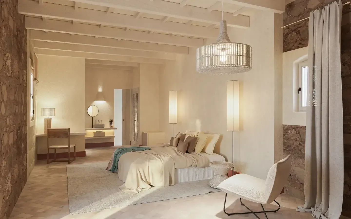 Amagatay, Balearic Islands — Minimalist hotel suite with cream bedding, pendant lighting, travertine walls, and wooden beam ceiling in warm neutral tones.