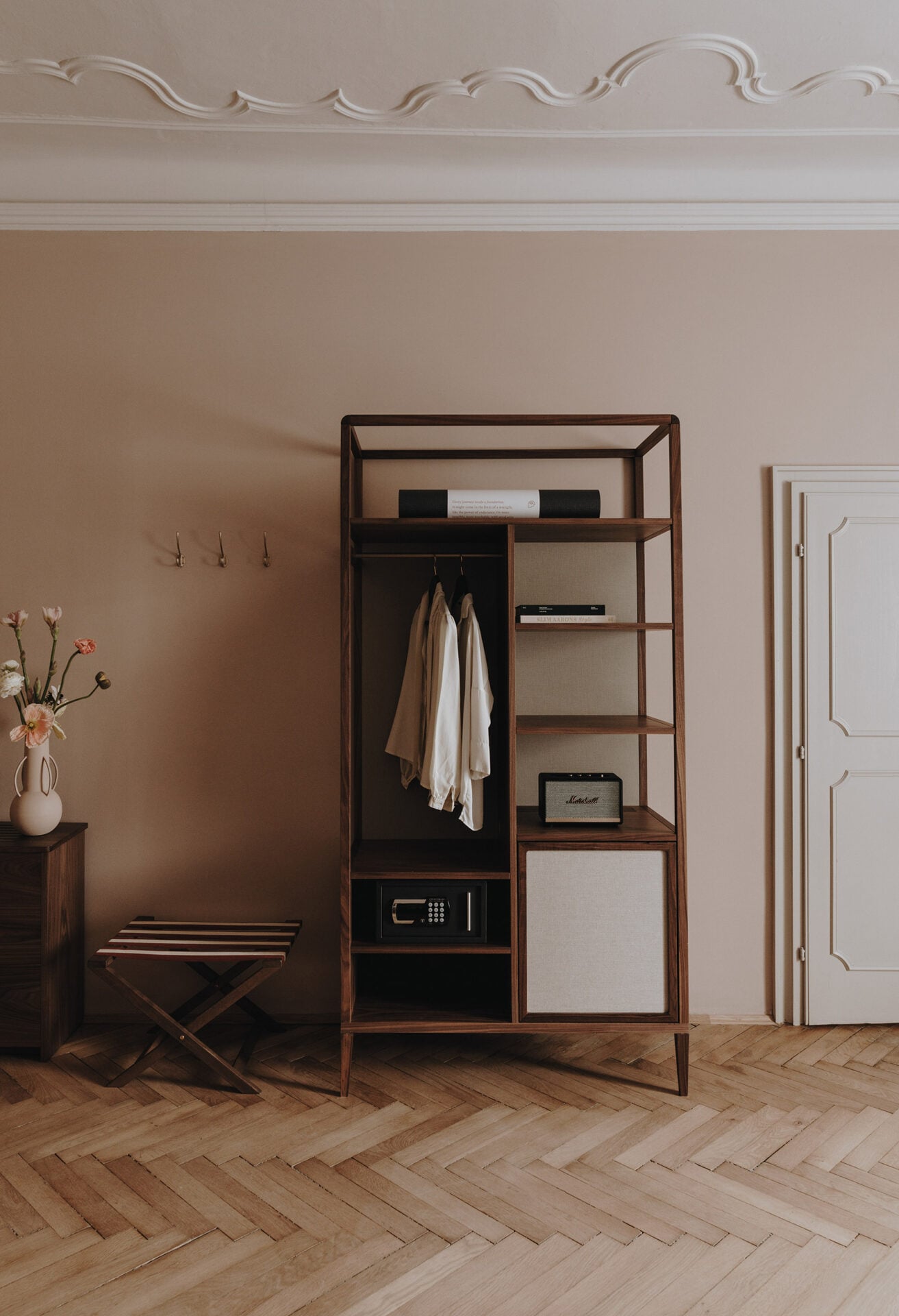 Wardrobe of room at Parkhotel Mondschein with herringbone flooring