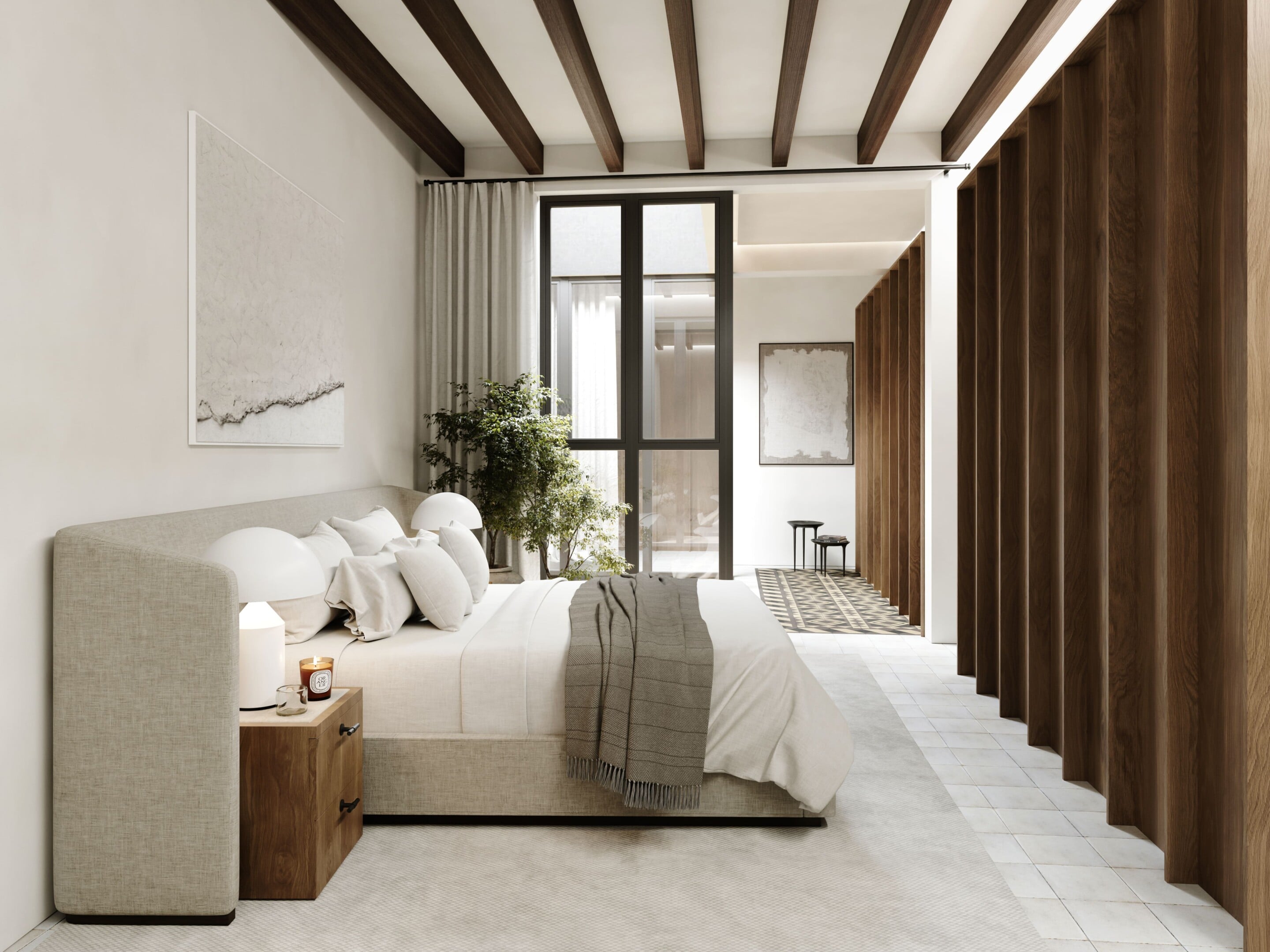 Bosseria, Balearic Islands, Spain — Modernist bedroom with exposed timber beams, cream upholstery bed, natural light, and expansive terracotta curtains.