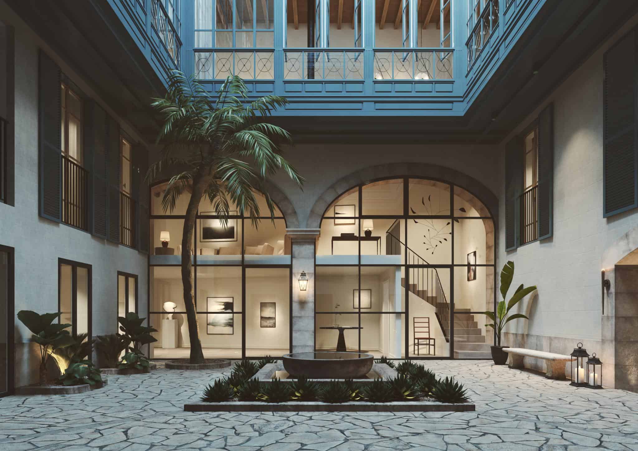 Renaissance Penthouse, Balearic Islands, Spain — Minimalist courtyard with arched windows, palm tree, skylight, stone flooring, and contemporary steel-framed glazing.