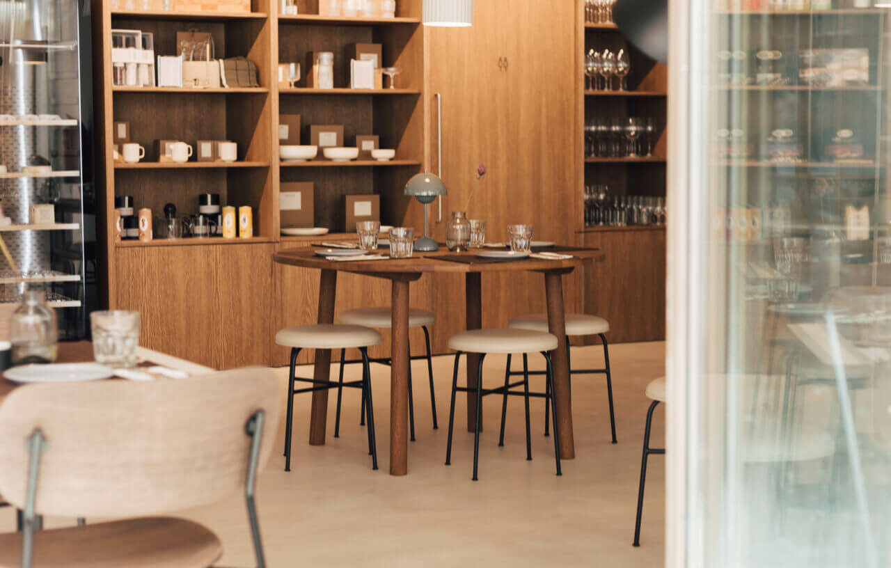 Seating area and shop of cafe at Placido y Grata Hotel